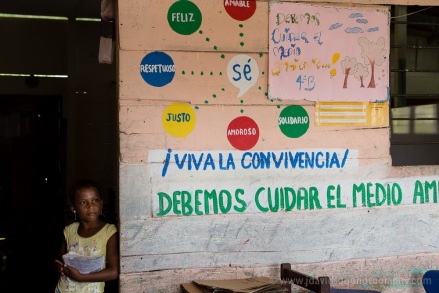 A young student pauses by a classroom in Nueva Venecia’s school.  